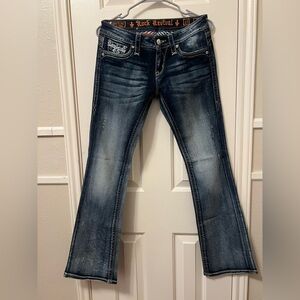 Rock revival jeans size27 Sora boot cut low rise miss me